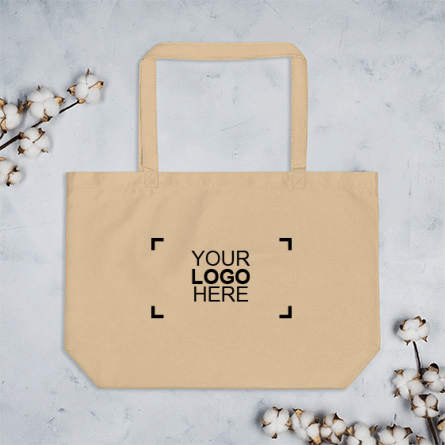 Sample custom tote bag on a marble background with a logo design